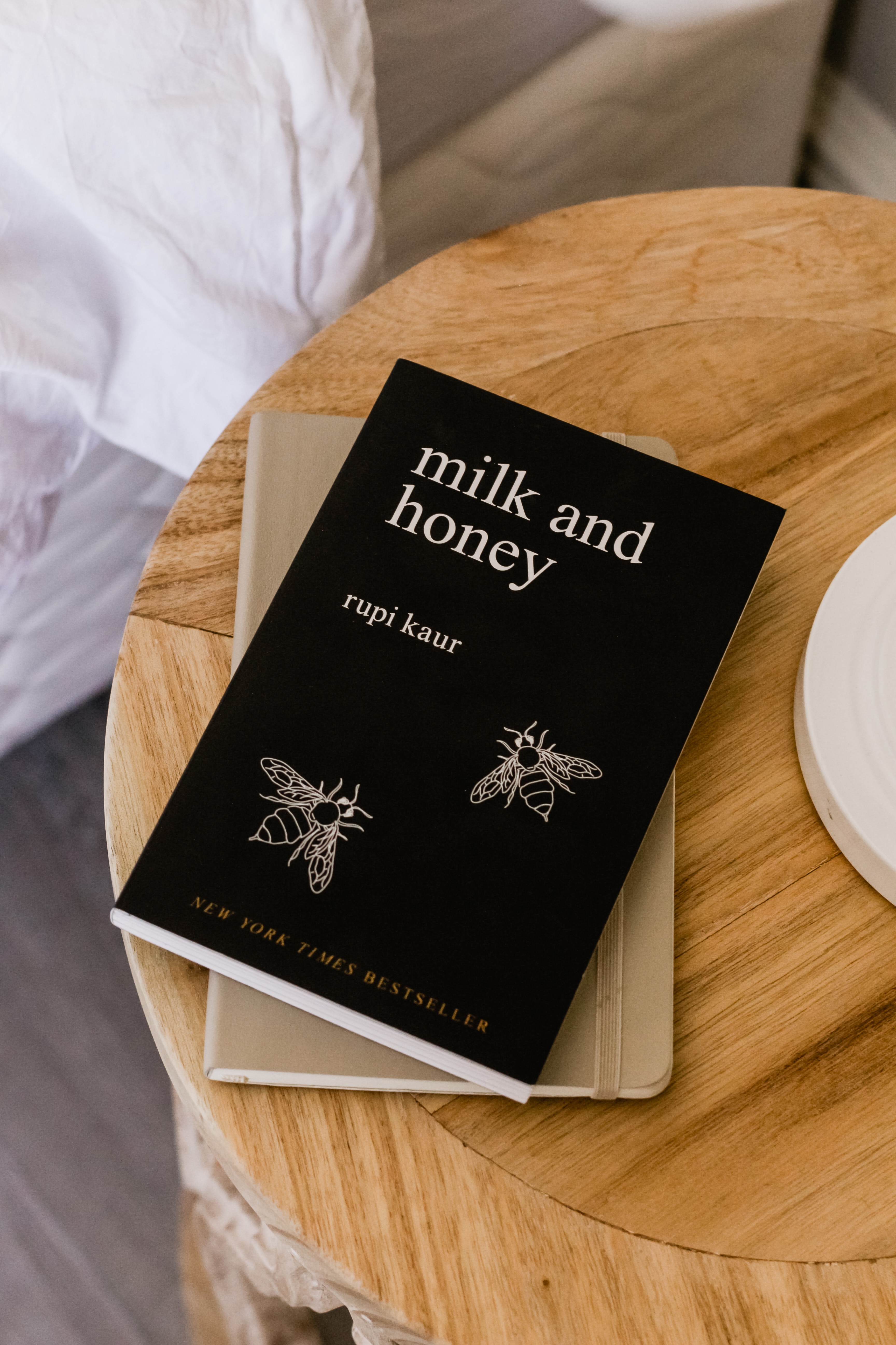 Milk and Honey book on table